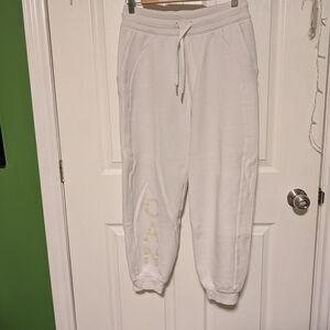 White Joggers with Gold Lettering